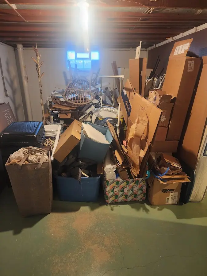 Roll-off dumpster container at job site for Yard Waste Dumpster Rental in Luzerne